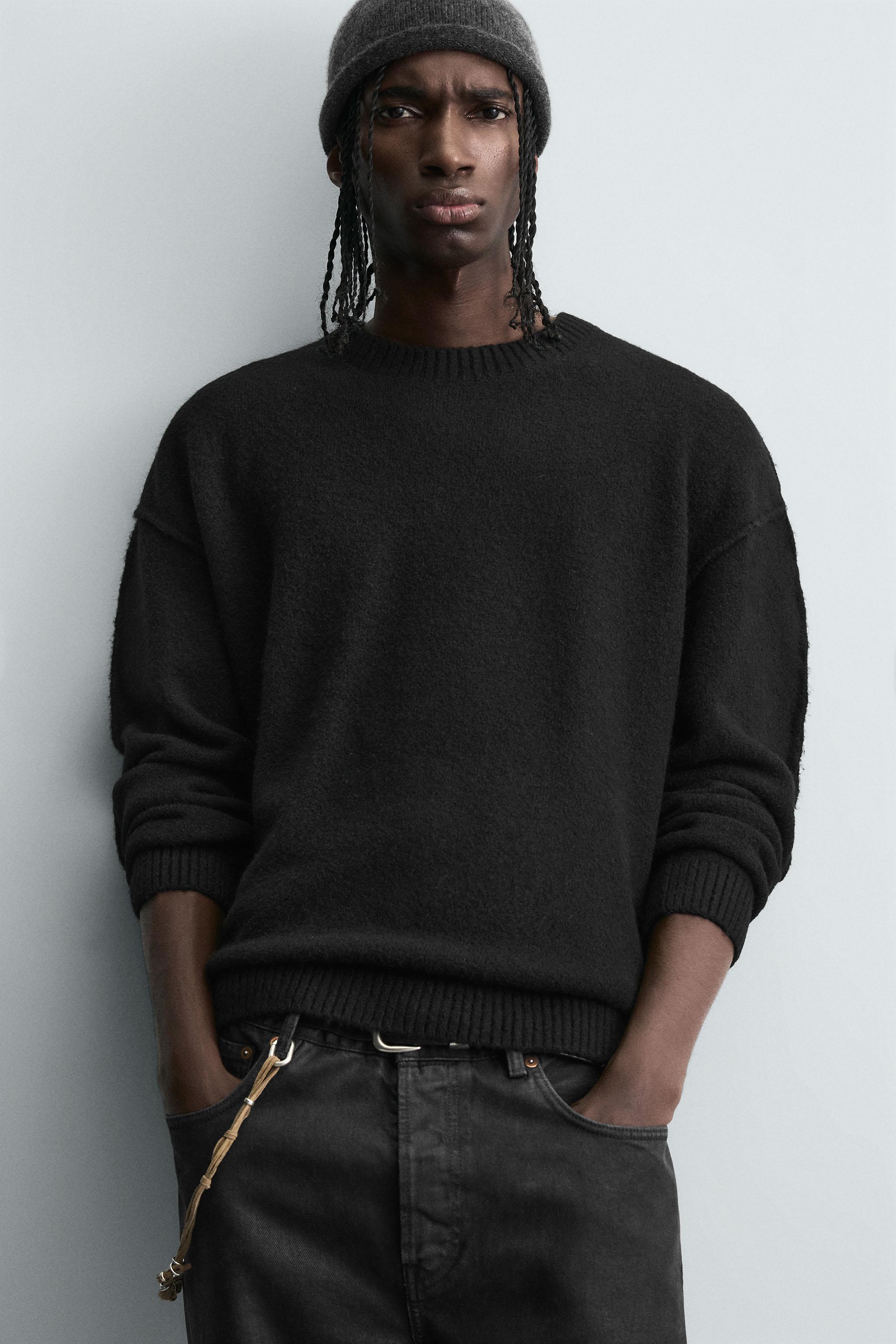 TEXTURED SWEATER WITH REVERSE EFFECT SEAMS